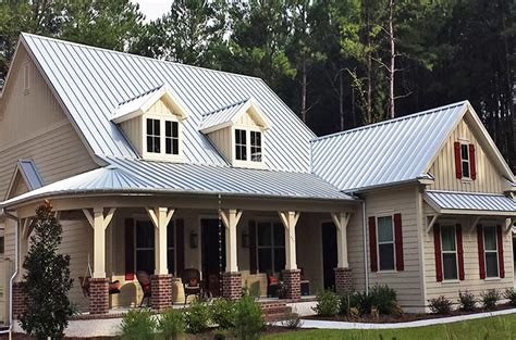 galvalume metal roof on white house|black metal roof white siding.